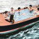 Illustration for article titled All You Need in a Boat: An 8-Foot Hot Tub and Four Coolers